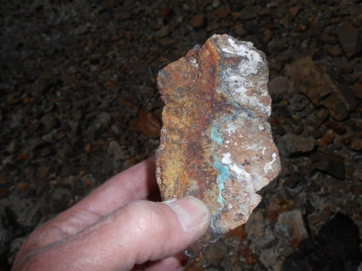 Lake Project - Secondary copper minerals (green) in shaft mullock